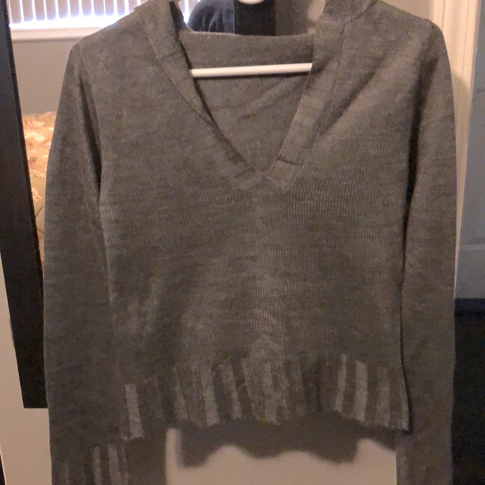 Grey hoodie sweater.
